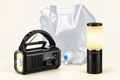 Home essentials set with radio, cylindrical lantern and folding water bag